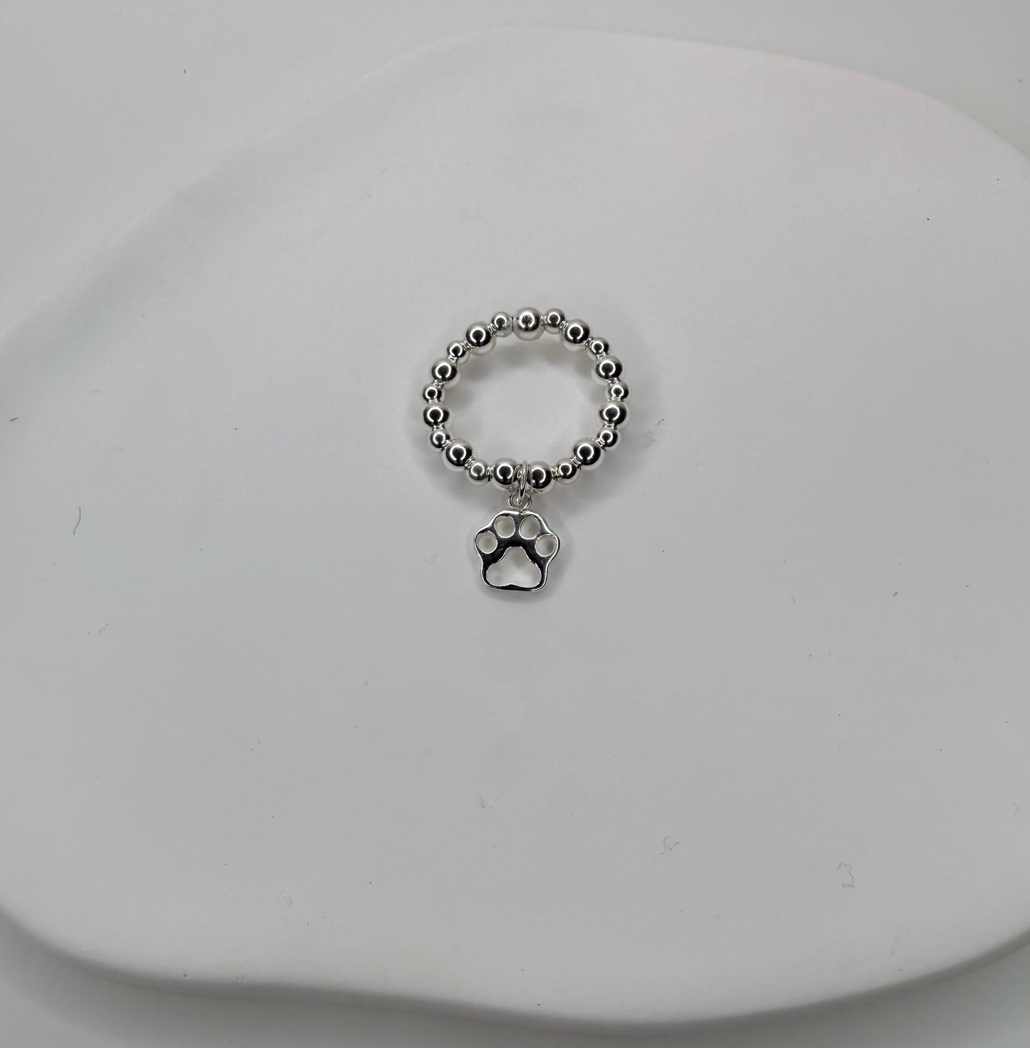 Open paw charm ring