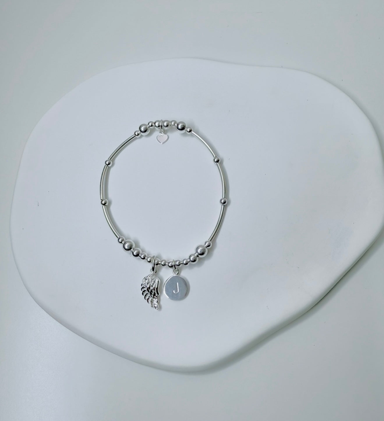 The Curved Bar Initial Disc Bracelet